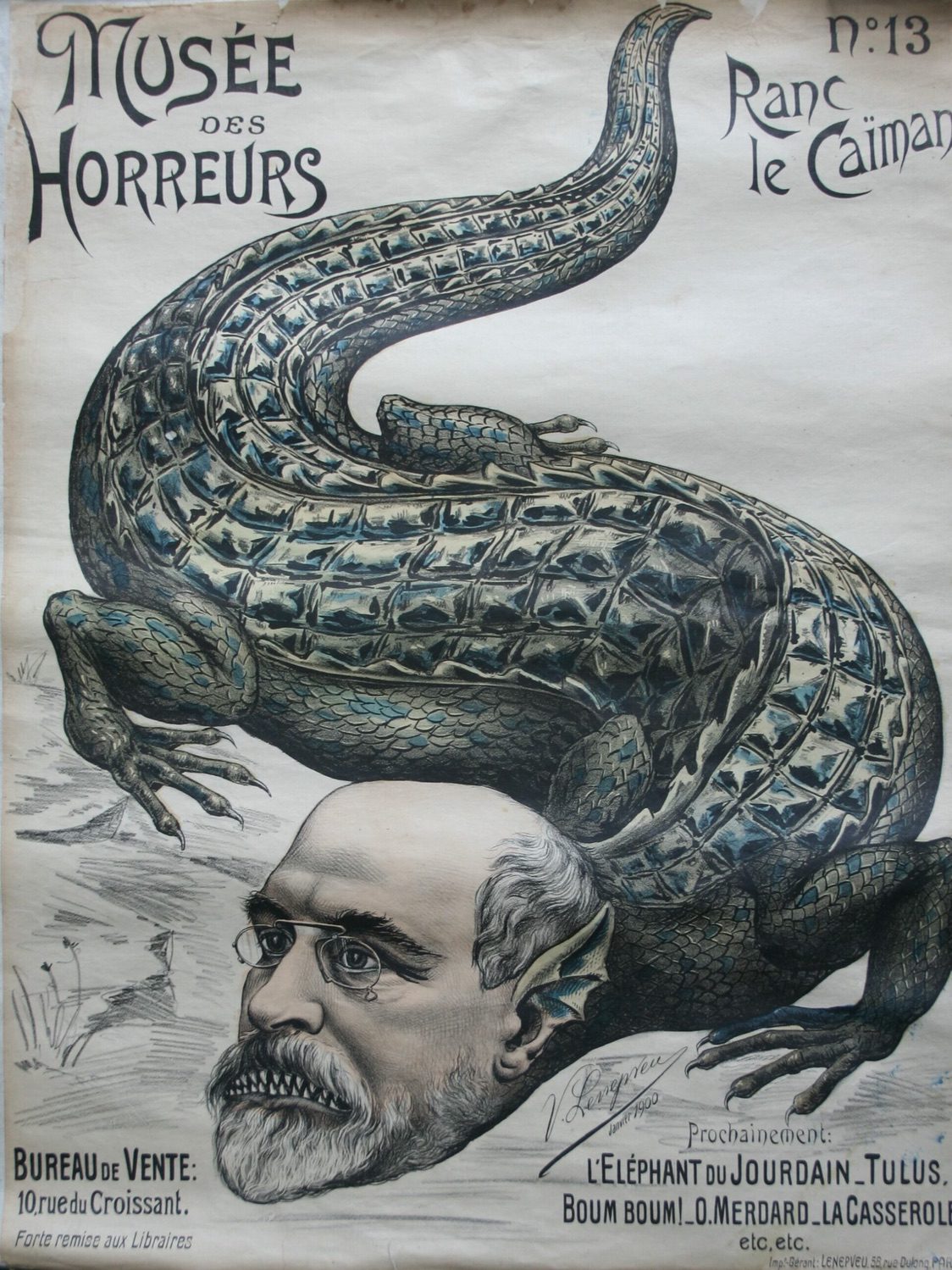 Poster with picture of a man with the body of a reptile.